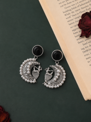 Moon Pearl black brass chandbali earrings with dancing-woman motif and pearl detailing