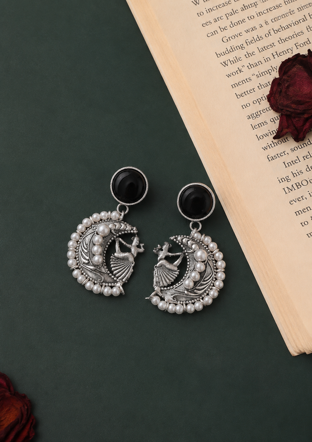 Moon Pearl black brass chandbali earrings with dancing-woman motif and pearl detailing