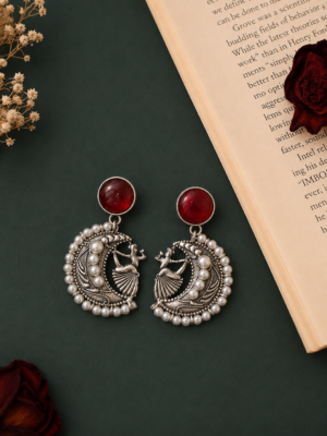 Moon Pearl ruby brass chandbali earrings with dancing-woman motif and pearl detailing