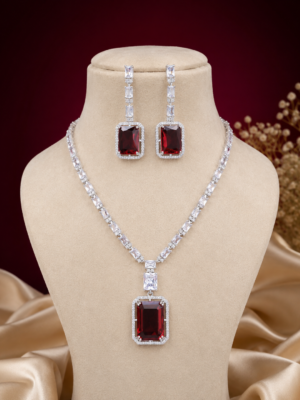 Himanshi red American diamond necklace set with matching earrings