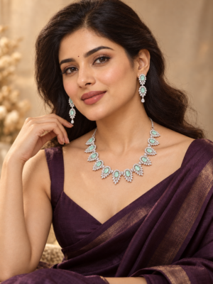 Asmita mint green American Diamond necklace set with matching drop earrings
