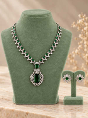 Green American Diamond necklace set with an ornate pendant and matching floral stud earrings