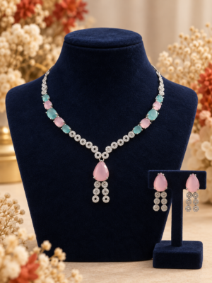 Riddhima multicolour American diamond necklace set with coloured teardrop stones, floral detailing and matching drop earrings