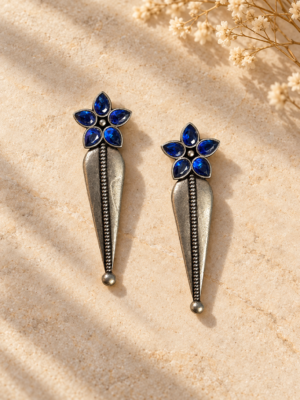 Blue brass earrings with a flower-inspired design