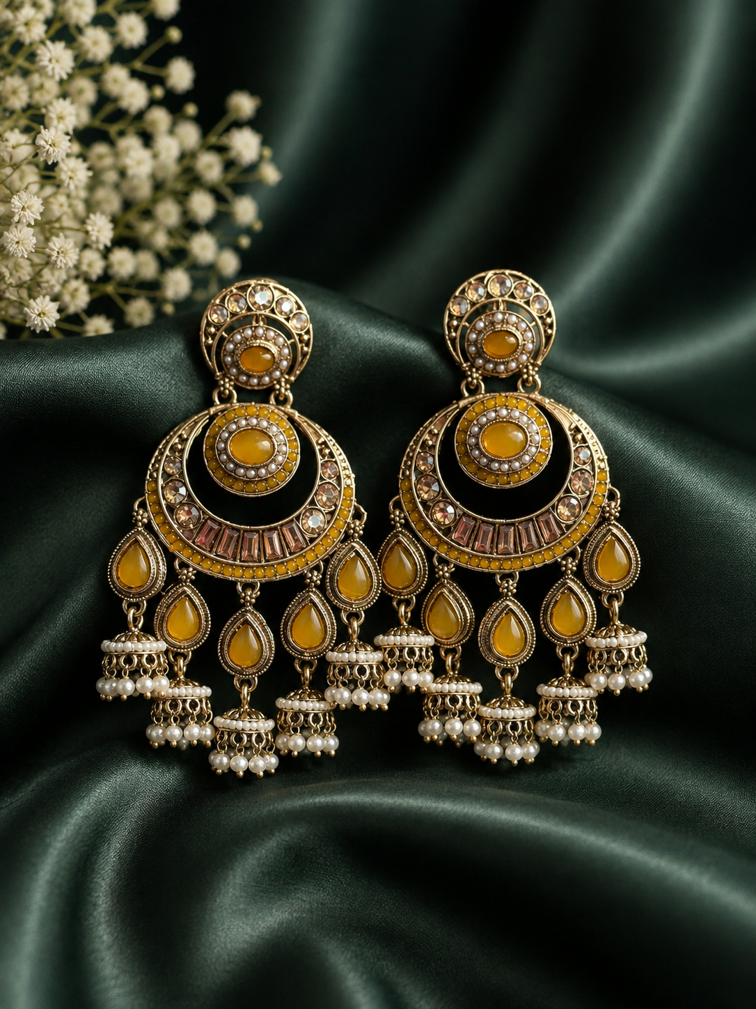 Arya yellow kundan chandbali earrings with gold plating and pearl jhumka drops