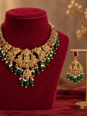 Kanakpriya dark green ruby Lakshmi temple jewellery set with peacock motifs and matching earrings