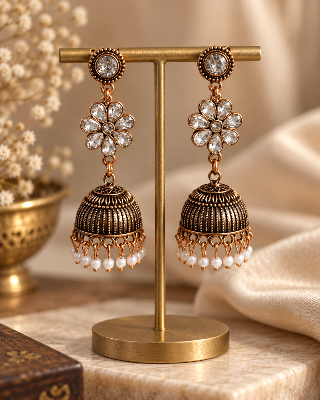 Anvika white stone oxidised floral jhumka earrings with bead drops