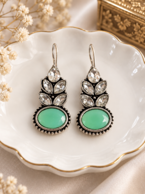 Navya mint green oxidised leaf stone drop earrings