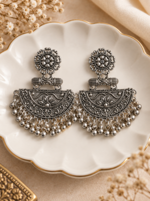 Oxidised floral chandbali earrings with metallic ghungroos