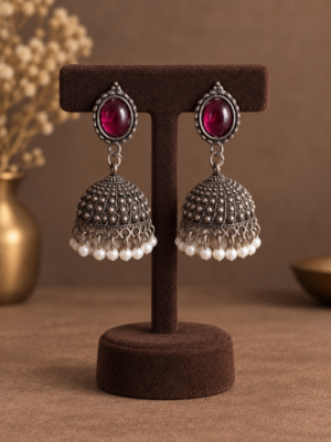 Dark pink stone brass jhumka earrings with pearl drops measuring 5 cm
