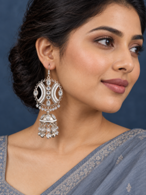 Maula mere Maula Earrings - White on a model