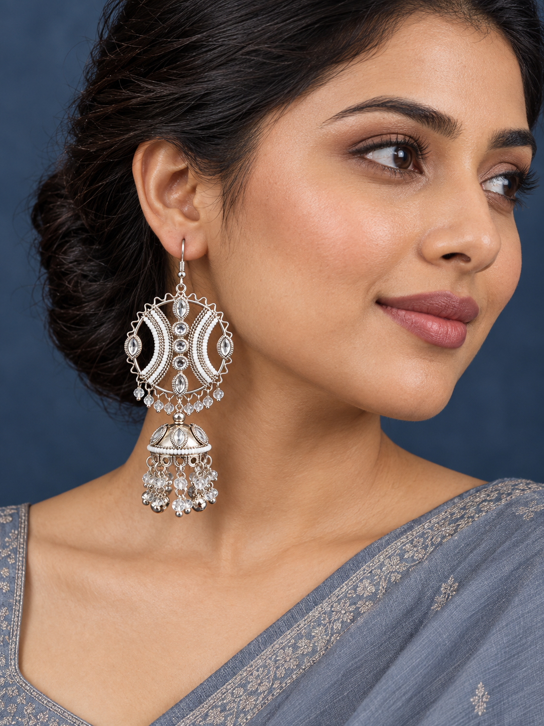 Maula mere Maula Earrings - White on a model