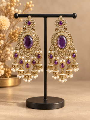 Samyukta purple Kundan jhumka earrings with oval stones and miniature jhumka drops