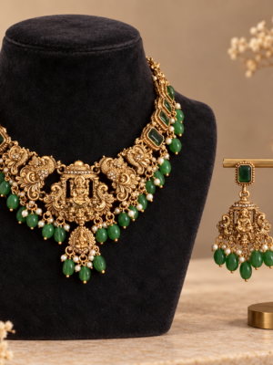 Kanakpriya emerald green Lakshmi temple jewellery set with peacock motifs and matching earrings