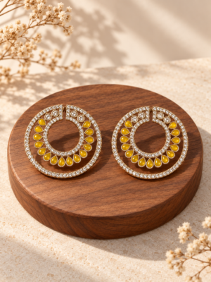 Ojasvi yellow circular Kundan stud earrings with teardrop stones and sparkling borders
