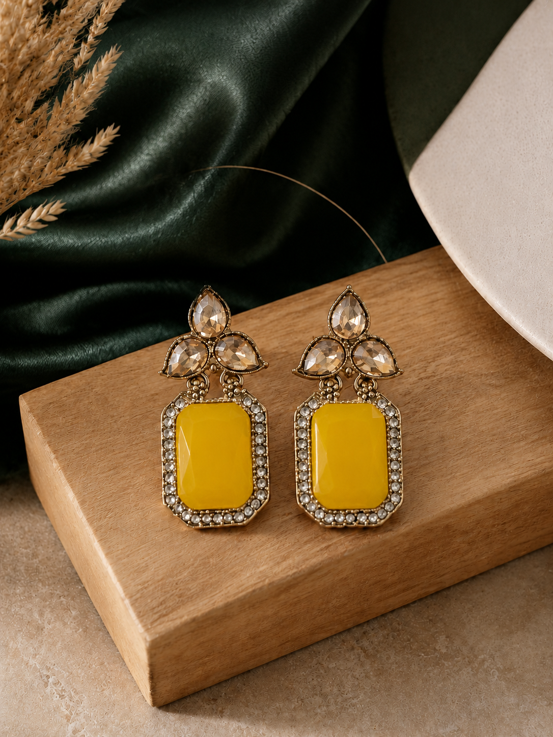 Aarini yellow Kundan stud earrings with rectangular stones