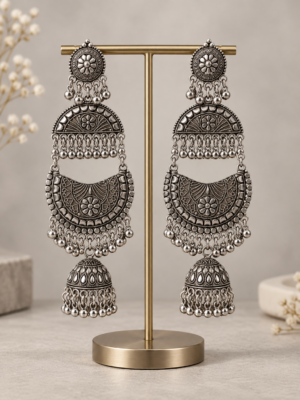 Mrinalini long oxidised jhumka earrings with floral motifs, layered crescents and hanging beads