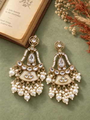 Radhika white Kundan dangler earrings with ornamental frames, teardrop accents and hanging beads