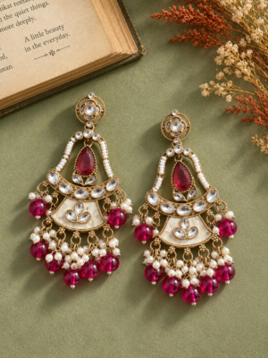 Radhika purple Kundan dangler earrings with ornamental frames, teardrop accents and hanging beads