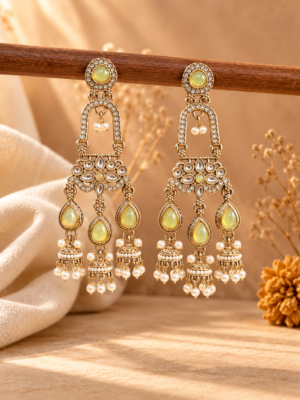Mrinalika mint green triple jhumka earrings with open arches, floral stone panels and three miniature jhumka hangings