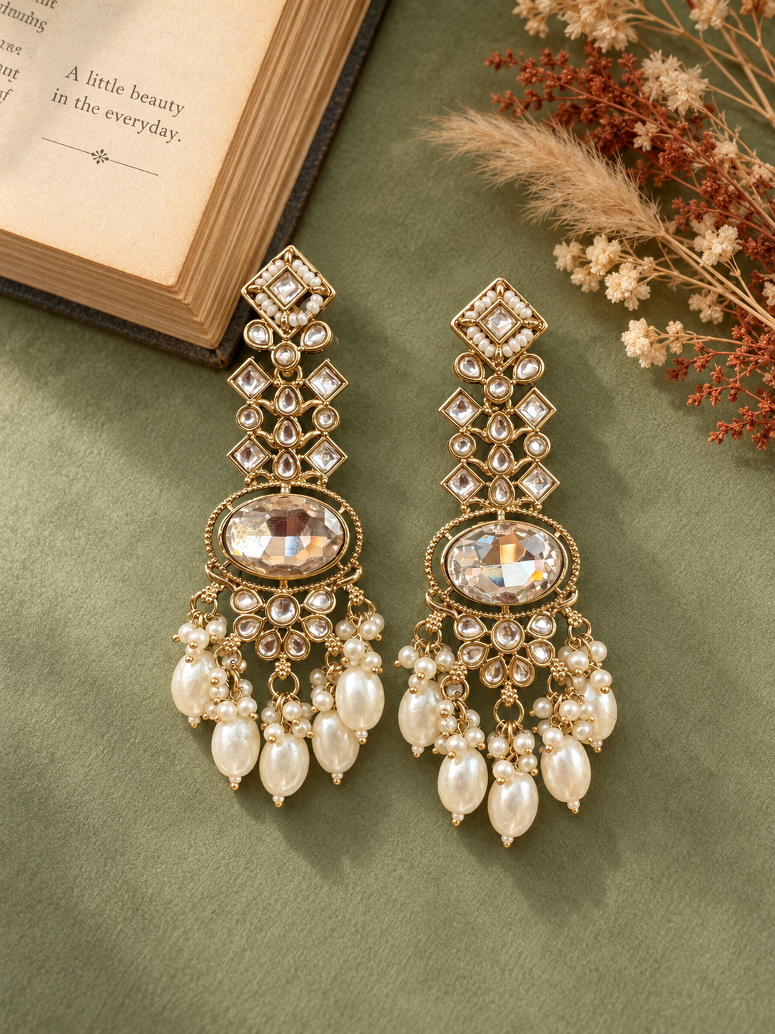 Saanvika white Kundan dangler earrings with geometric stones, oval centres, floral motifs and hanging beads