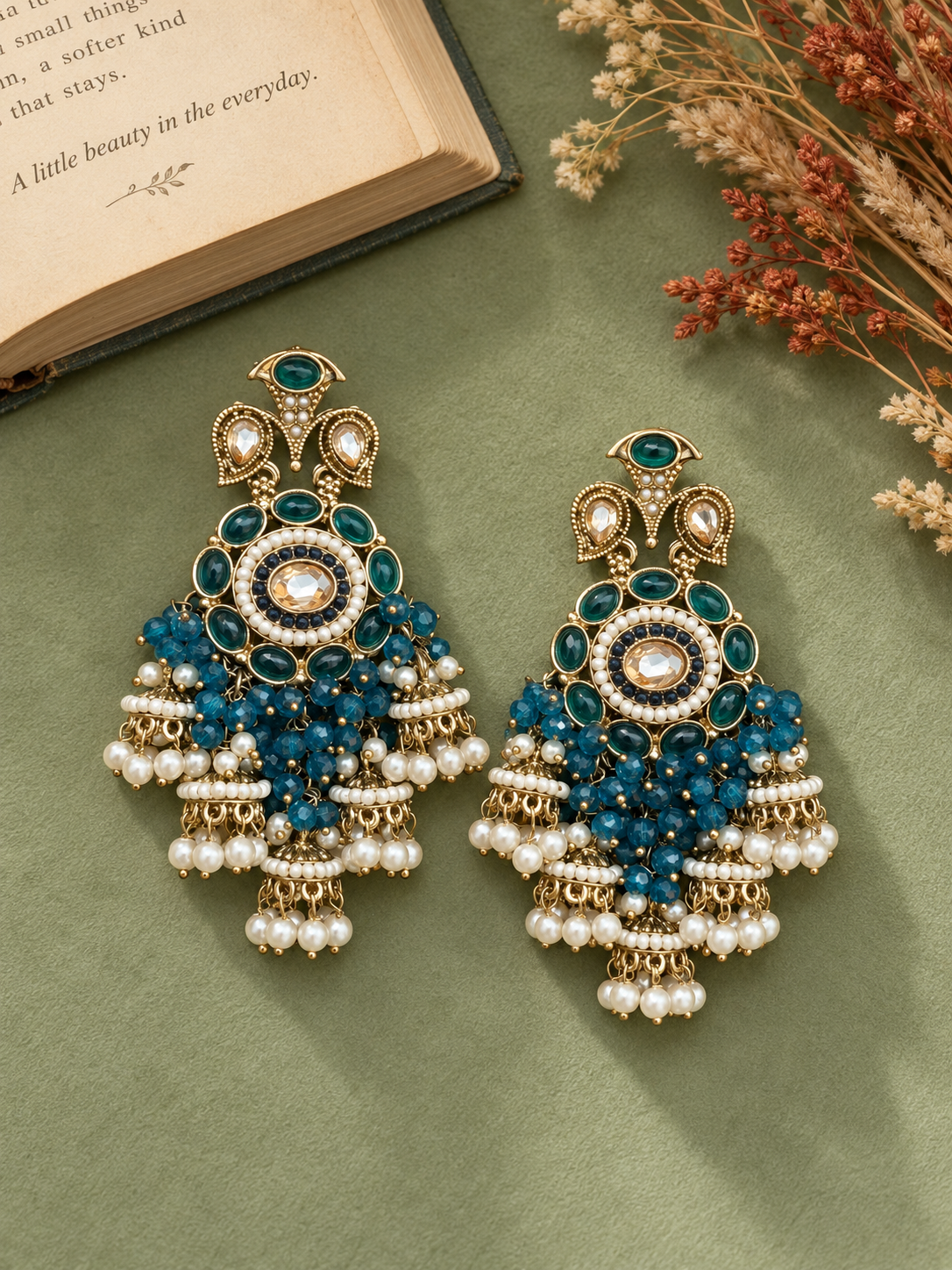 Purvi teal blue statement jhumka earrings with circular motifs and miniature hanging jhumkas