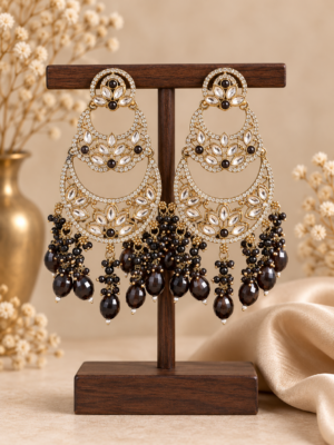 Varnika black layered Kundan chandbali earrings with floral motifs, clear stone borders and cascading faceted bead drops