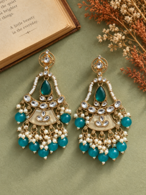 Radhika blue Kundan dangler earrings with teardrop centres, white stonework and blue bead drops